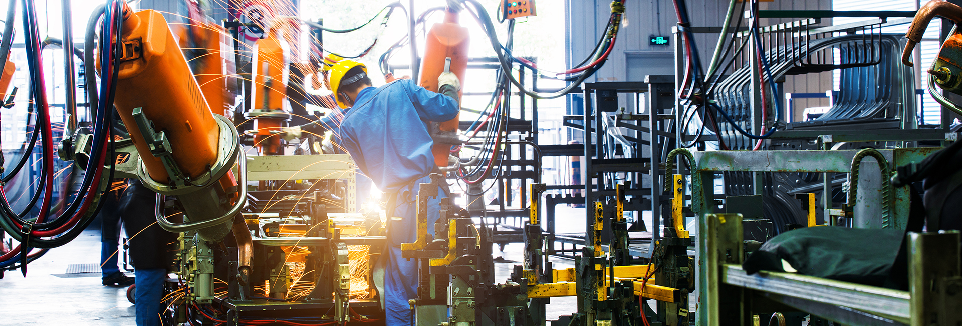 Welding Robots Movement In A Car Factory